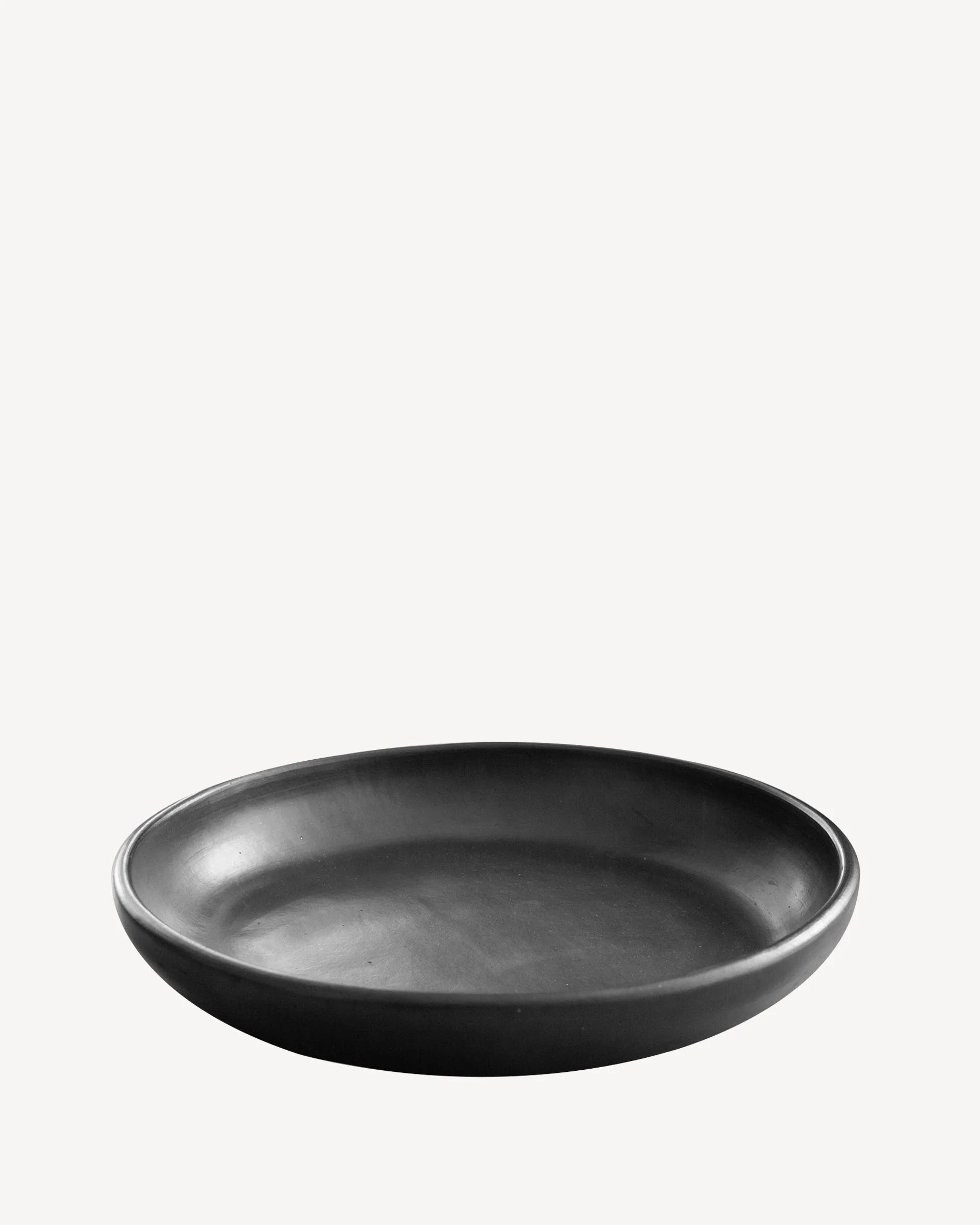 Grand plat rond en argile noire Chamba Ø33cm